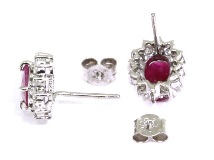 Real ruby and diamond shops set in 18kt White solid gold post earrings.